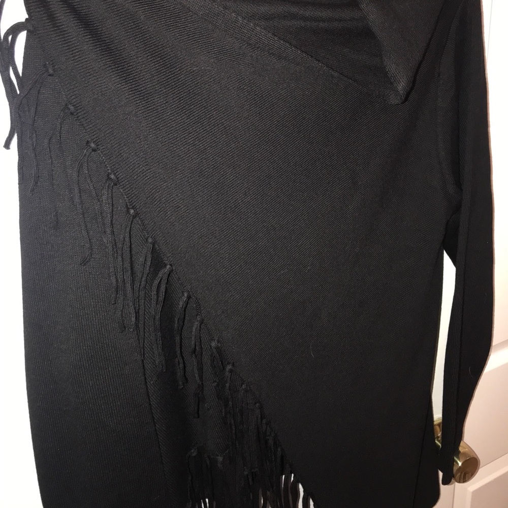 Cute little black poncho, worn once.